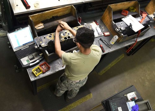 Photo of me repairing equipment